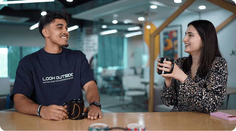 Colleagues having coffee and chatting